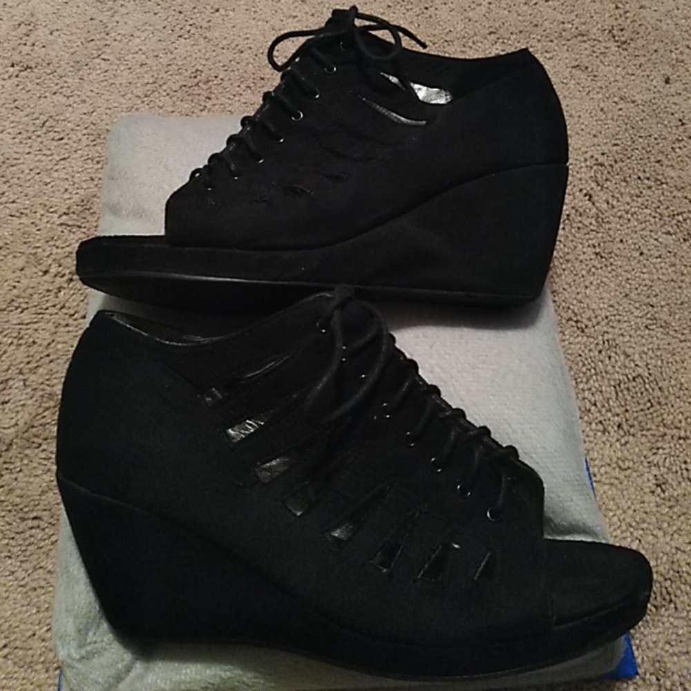 Wedge open toe shoes.